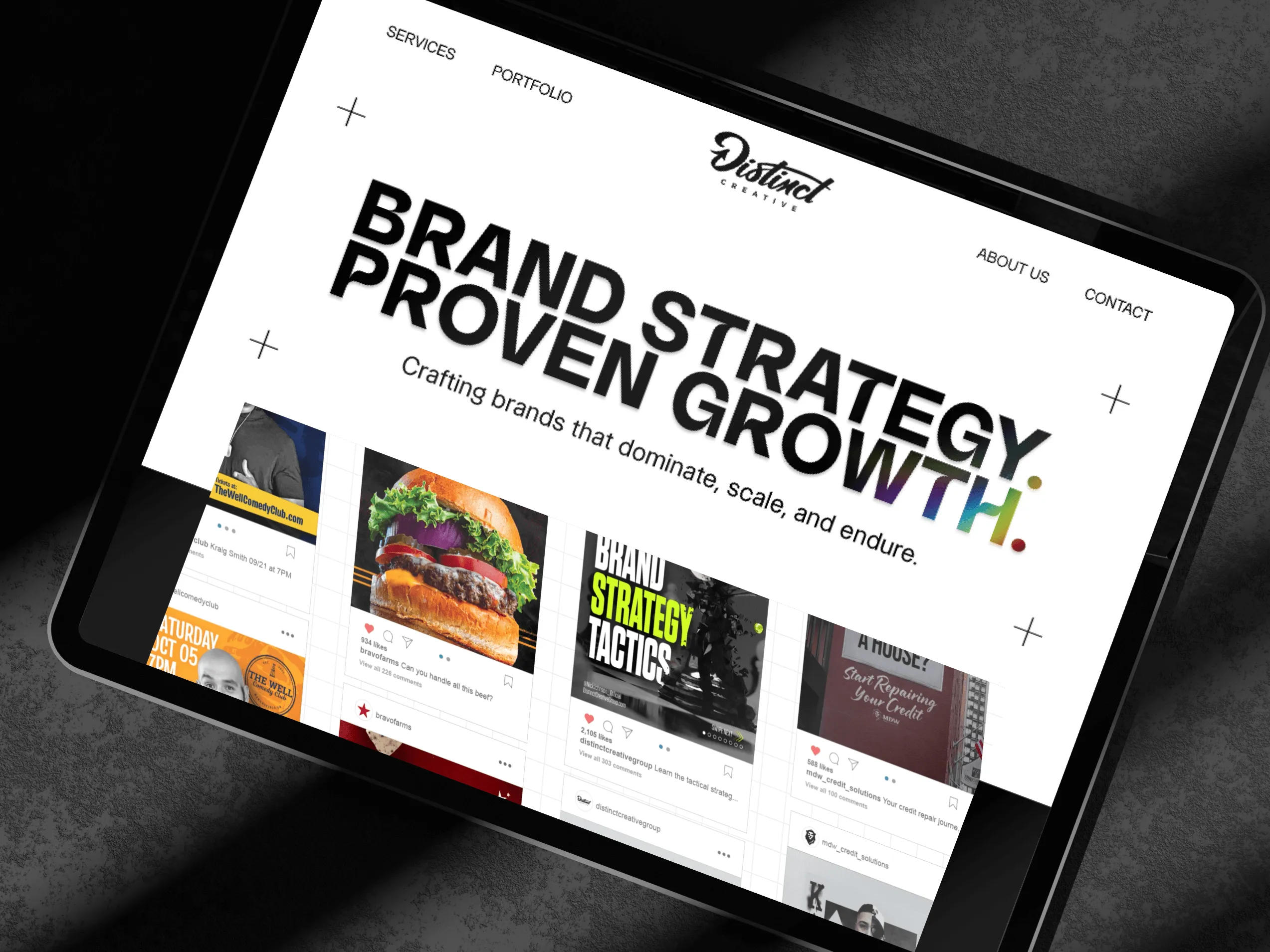 Distinct Creative Group website mockup displayed on a tablet